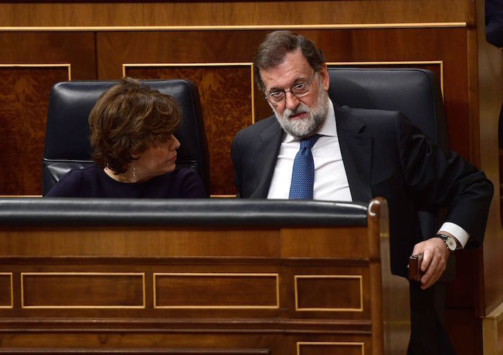 Sáenz de Santamaría y Rajoy, en una imagen de archivo. (Pierre-Philippe MARCOU/AFP)