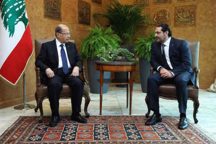 El presidente libanés, Michel Aoun, junto al primer ministro, Saad Hariri. (AFP)