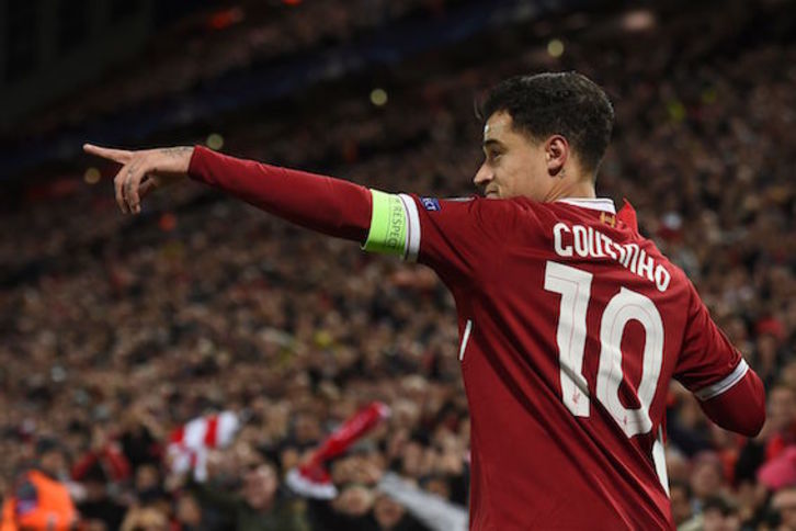 Coutinho, con tres tantos, ha liderado el 7-0 que el Liverpool ha endosado al Spartak de Moscú. (Paul ELLIS/AFP)