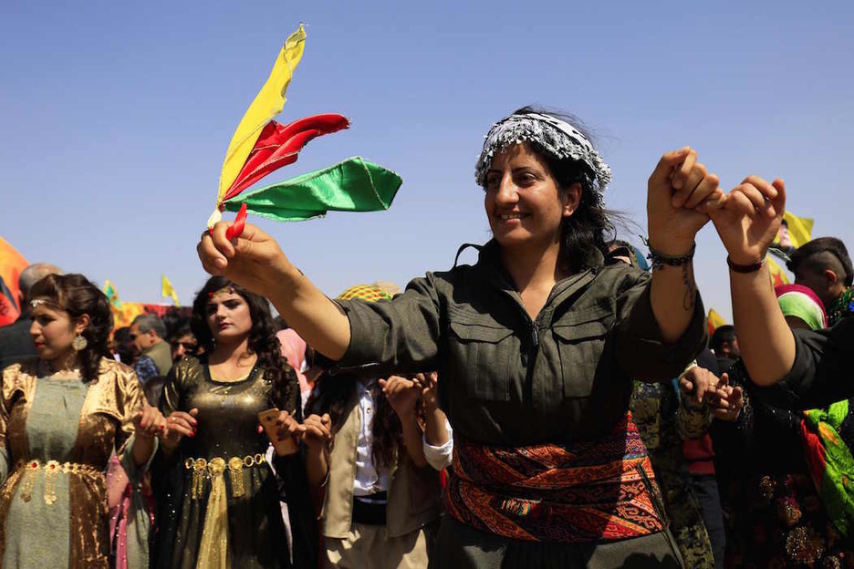 Qamishiin dantza eta alaitasuna izan dira nagusi. (Delil SOULEIMAN / AFP) Qamishiin dantza eta alaitasuna izan dira nagusi. (Delil SOULEIMAN / AFP)