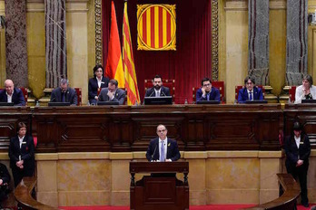 Jordi Turull, durante su discurso hoy en el pleno de investidura del Parlament. (Lluís GENÉ/AFP)