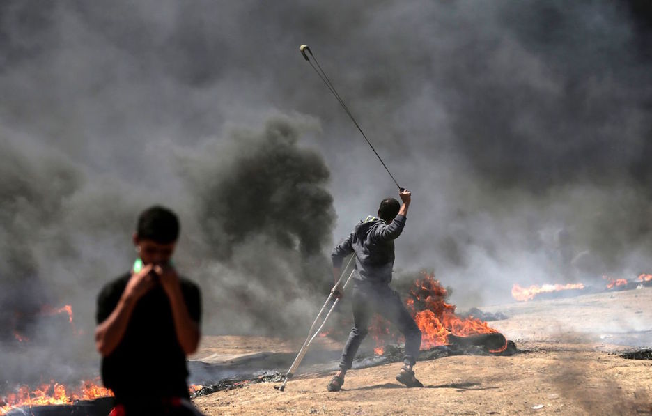 Piedras contra balas en la franja de Gaza. (Mahmud HAMS / AFP)