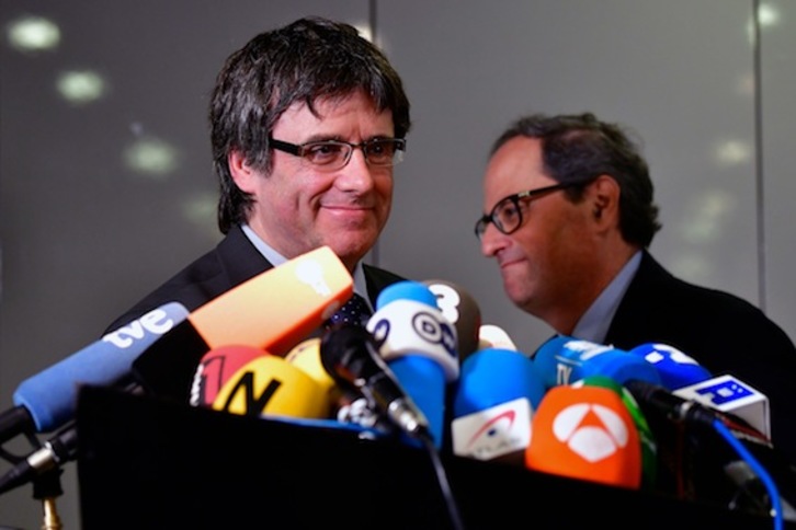 Carles Puigdemont, en una comparecencia junto a Quim Torra en Berlín. (Tobias SCHWARZ/AFP)
