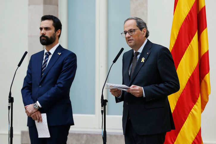 Torrent y Torra, en una comparecencia conjunta. (Pau BARRENA / AFP)