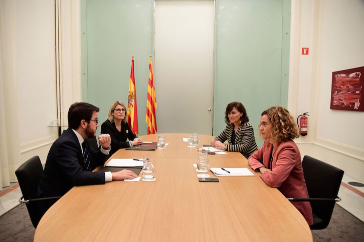 Carmen Calvo, Pere Aragonés y  Elsa Artadi, en una reunión realizada en diciembre. (Javier SORIANO / AFP)