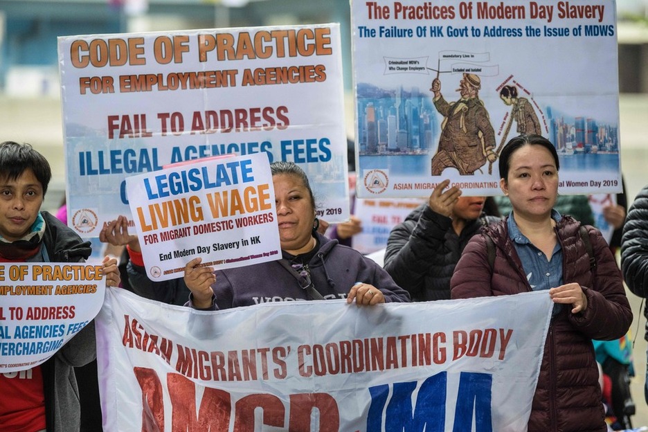 Protesta de mujeres migrantes en Hong Kong (ANTHONY WALLACE / AFP)