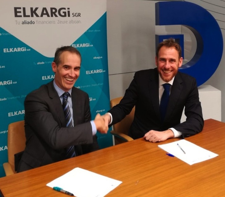 Zenón Vázquez Irizar, director general de Elkargi, y Juan Antonio Goñi Rodríguez, director del área digital de Dominion.