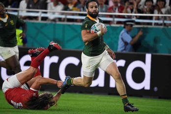 Cobus Reinach, tercer medio melé de Sudáfrica, ha vivido sus veinte minutos de gloria con tres ensayos. (Filippo MONTEFORTE / AFP) 