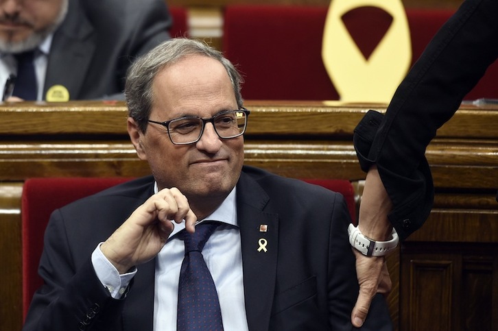 Quim Torra, felicitado tras su intervención. (Josep LAGO | AFP)