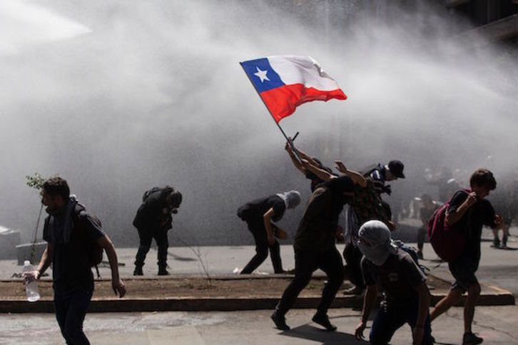 Protestas en Santiago de Chile. (Claudio REYES/AFP)