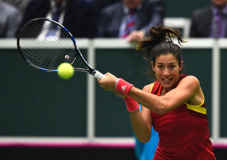 Muguruza, durante un partido (Michal CIZEK / AFP)