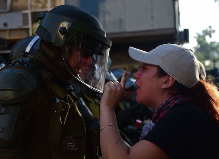 Protestas en las calles de Santiago. (Johan ORDONEZ / AFP)