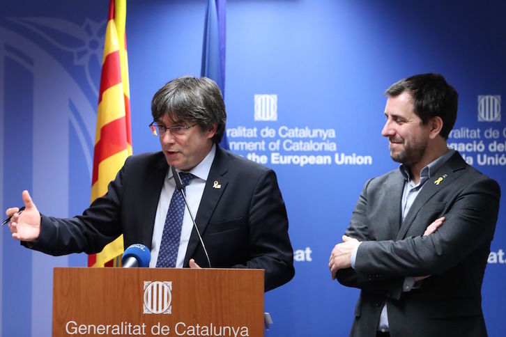 Puigdemont y Comín han comparecido esta tarde en Bruselas. (Aris OIKONOMOU / AFP)