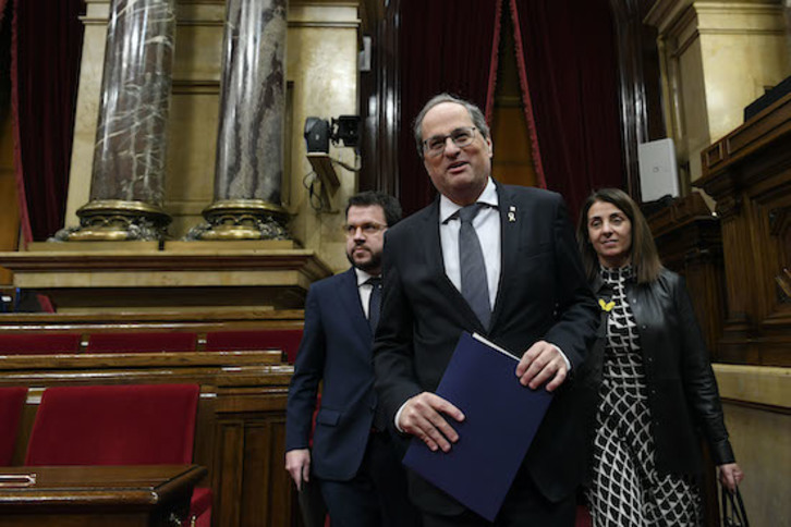 Budó junto a Torra y Aragonès. (Lluis GENE/AFP)