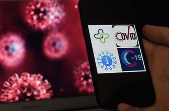 Logotipos de las aplicaciones de seguimiento de coronavirus en las que se trabajan. (Olivier DOULIERY/AFP)
