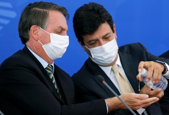 Bolsonaro y su exministro Mandetta, en una imagen ya de archivo. (SERGIO LIMA-AFP) 