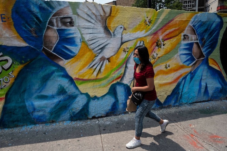 Mural sanitario en México D.F. (Pedro PARDO-AFP) 
