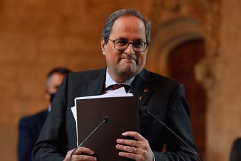 Quim Torra ayer, durante la declaración institucional tras ser inhabilitado. (Pau BARRENA/AFP)