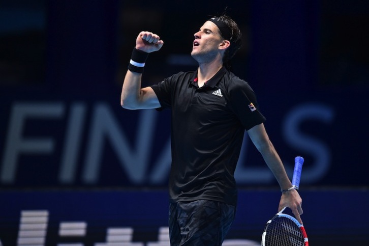 Dominic Thiem celebra un punto en el partido contra Nadal (Glyn KIRK / AFP)