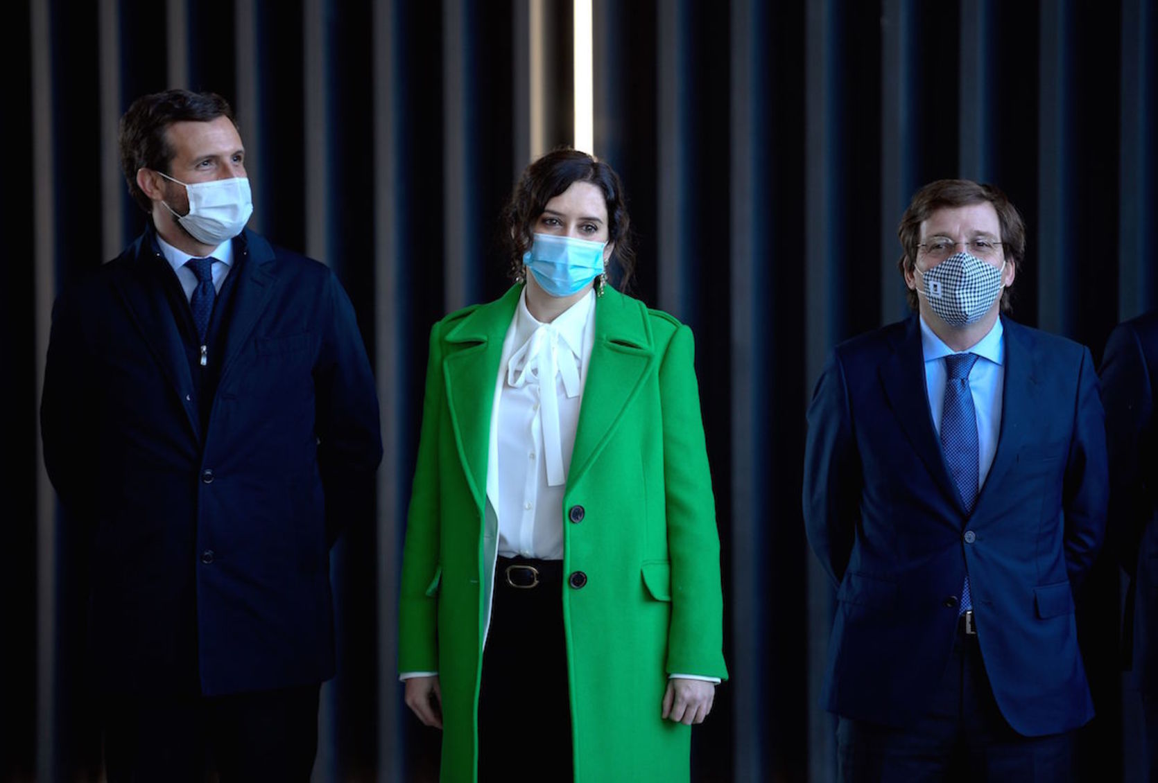 Casado, Díez Ayuso y Martínez Almeida. (Oscar DEL POZO | AFP)