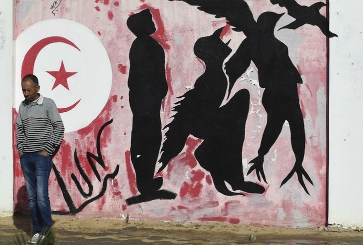 Mural de conmemoración del martirio de Mohamed Buazizi, chispa que encendió las protestas. (Fethi BELAID/AFP) 