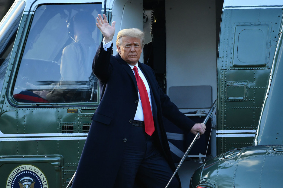 Horas antes, Trump ha abandonado la Casa Blanca. (Mandel NGAN/AFP)