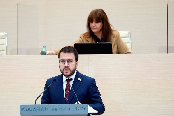 Pere Aragonès, durante el discurso de investidura, con la presidenta del Parlament, Laura Borràs, detrás.Quique GARCÍA/POOL EFE