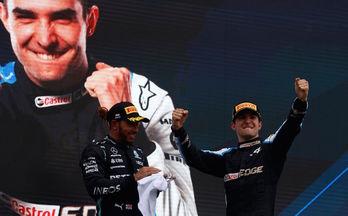 Ocon celebra su primer triunfo en la F1 ante un feliz Hamilton, que recupera el liderato del Mundial. (Florion GOGA/AFP)