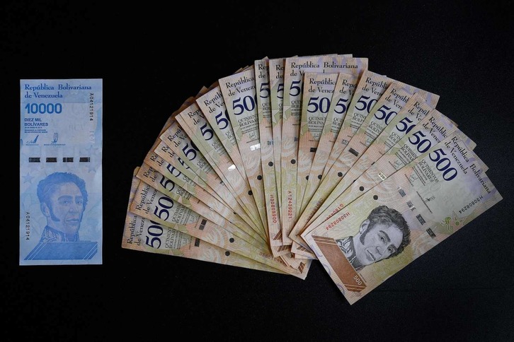 El organismo ha aclarado que la introducción del bolívar digital no afectará al valor de la moneda. (Federico PARRA/AFP)