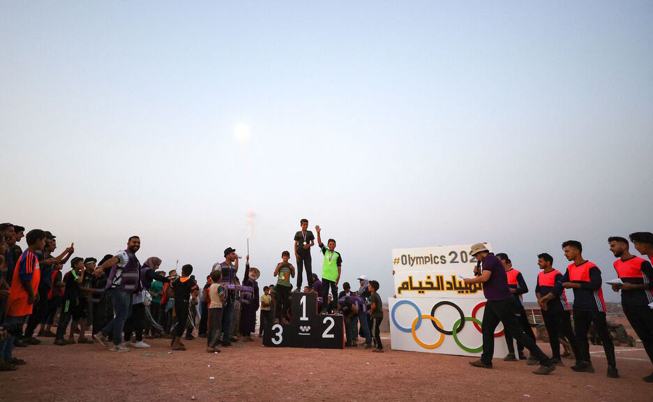 Dominak banatzeko unea. (Omar Haj KADOUR | AFP)