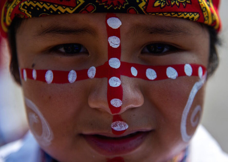 Uno de los participantes en las ceremonias de conmemoración. (Claudio CRUZ/AFP)