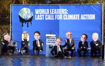 Acción, ayer en Glasgow, para reclamar a los líderes mundiales acciones más contundentes ante la emergencia climática. (Andy BUCHANAN/AFP)
