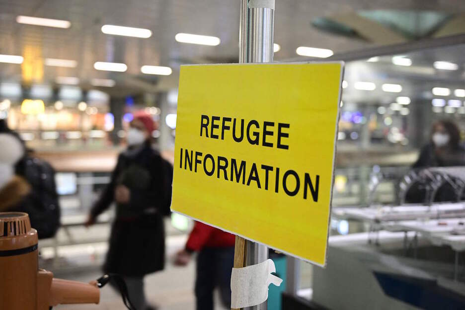 Punto de información para refugiados en la estación de tren de Berlín.