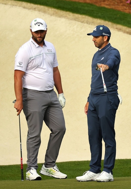 Jon Rahm, con el ganador de 2017 Sergio García.