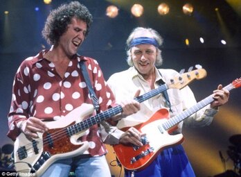 John Illsey y Mark Knopfler.