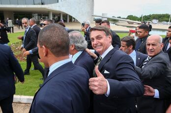  El candidato a la reelección, el ultraderechista Jair Bolsonaro, a su llegada al palacio de Planalto.