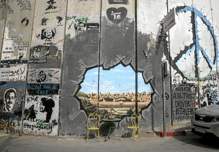 Grafitis dibujados en Belén, en el muro de la vergüenza construido por Israel en Cisjordania.