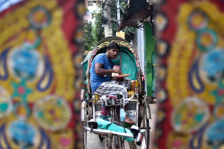 Rickshaw, a la espera de clientes.