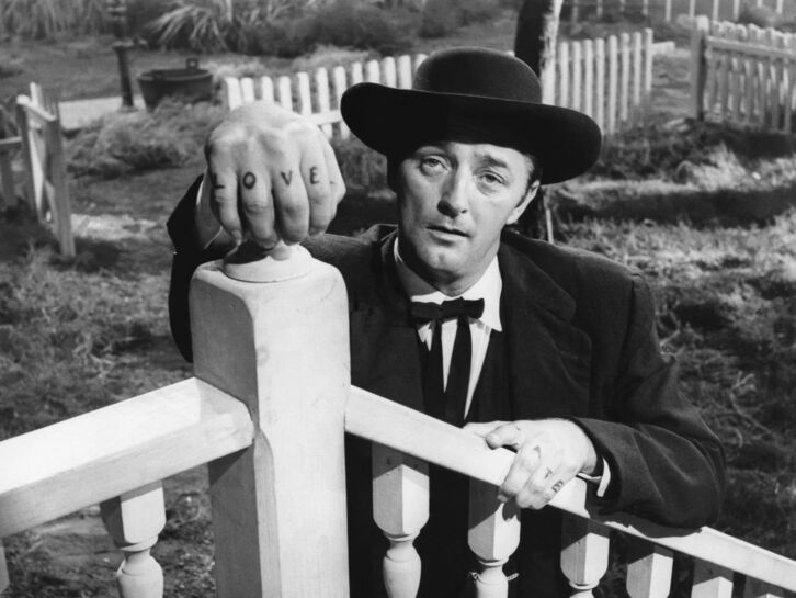 Robert Mitchum en su icónica imagen de "La noche del cazador'.