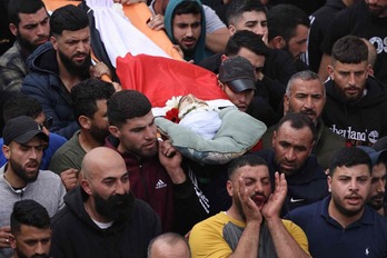 Funeral de una de las víctimas en Mughayir.