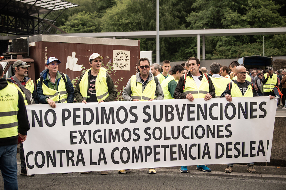 Pancarta con las reivindicaciones de los agricultores.