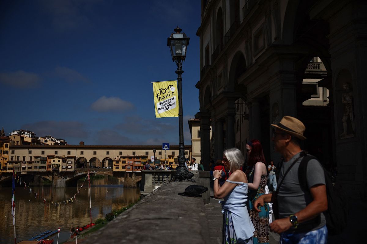 Varios turistas, estos días en Florencia. (Anne-Christine POUJOULAT/AFP)