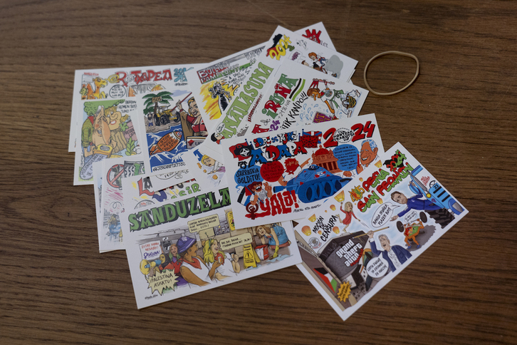 Las pancartas de las Peñas de este año vuelven a tocar los principales temas de actualidad. (Iñigo URIZ/FOKU)