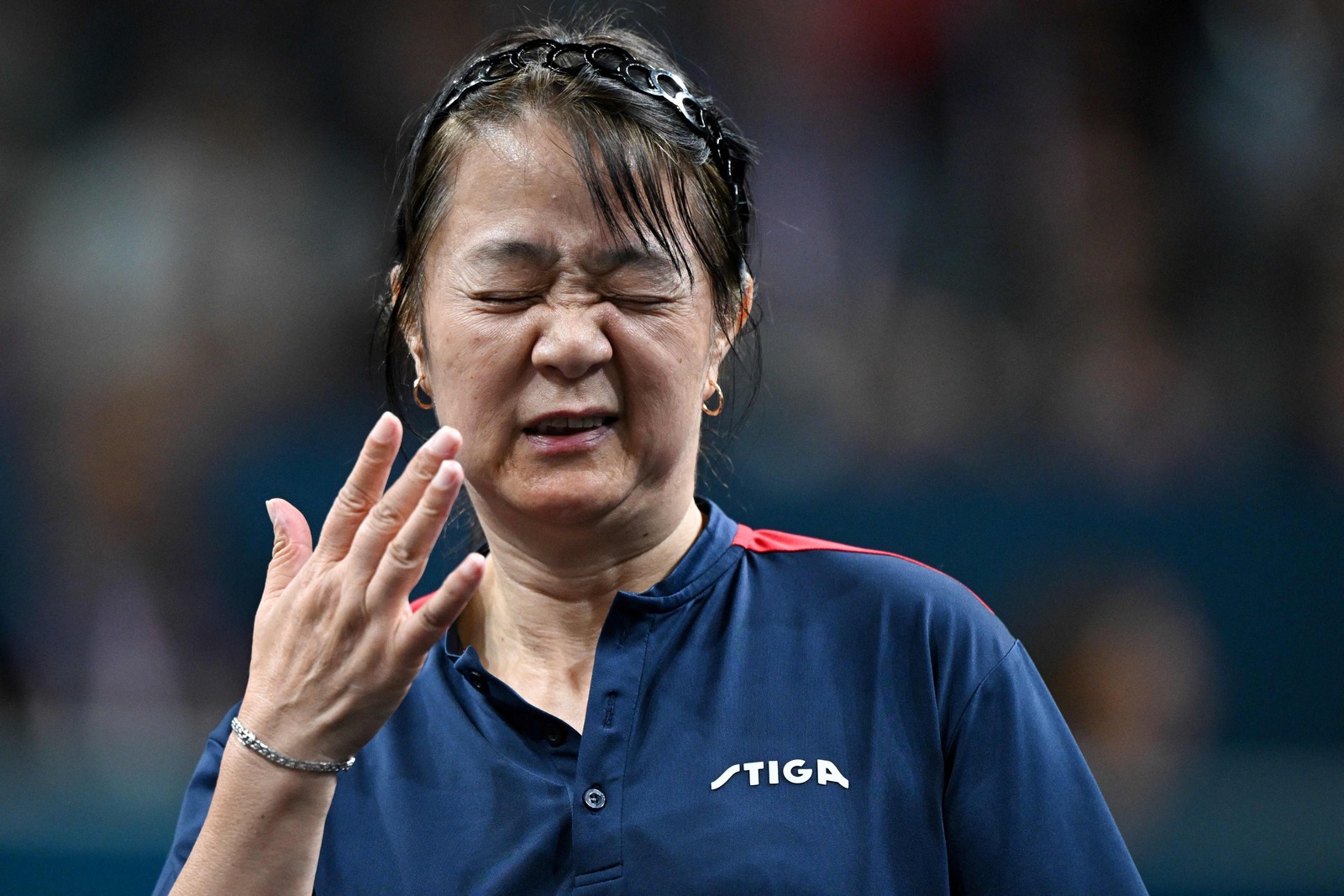 Pese al gesto contrariado en la foto, Zhiying Zeng ha salido radiante de su estreno olímpico en París. (AFP)