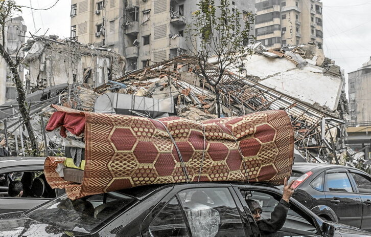 Residente vuelven a los barrios del sur de Beirut tras el alto el fuego.