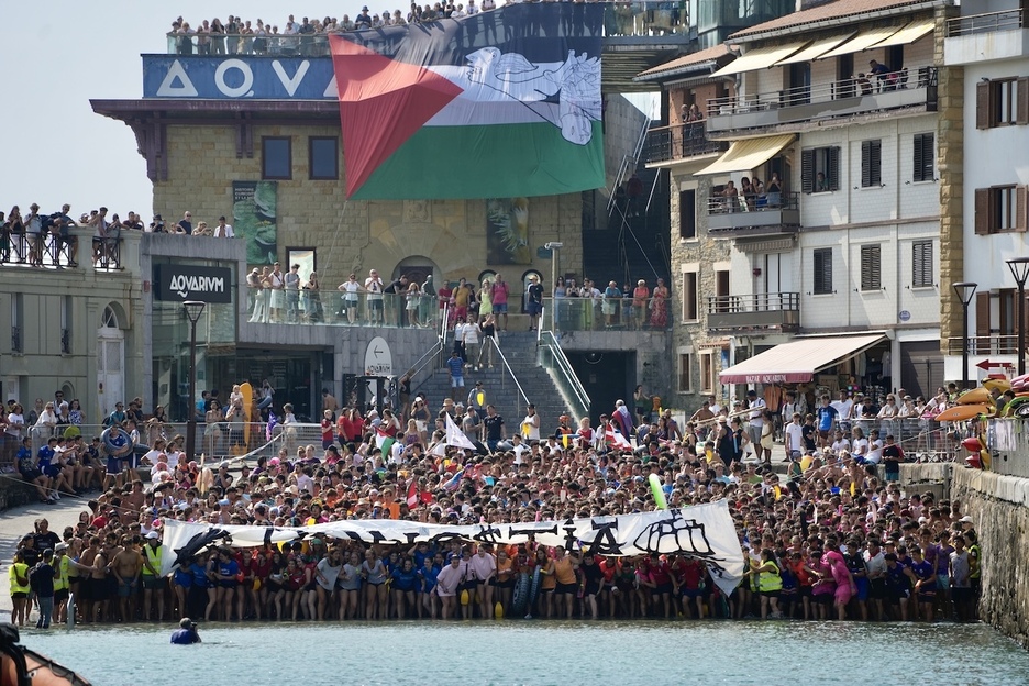 Parte hartzaileak baltsetara korrika.