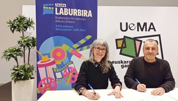 Irati Iciar Taupako lehendakaria eta Martin Aramendi UEMAko lehendakaria, hitzarmena sinatzen.
